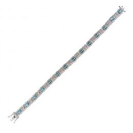 97   -  <p><span class="object_title">Pulsera articulada en plata con símiles de zafiro azul talla esmeralda y circonitas blancas engastadas en garras. 19 cm. </span></p>